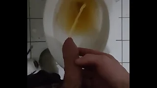 Twink pissing in toilet